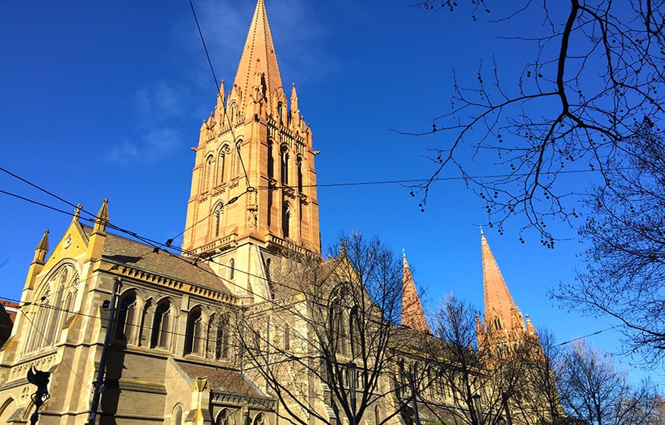 view of st paul cathedral and blue sky on a sunny day in melbourne