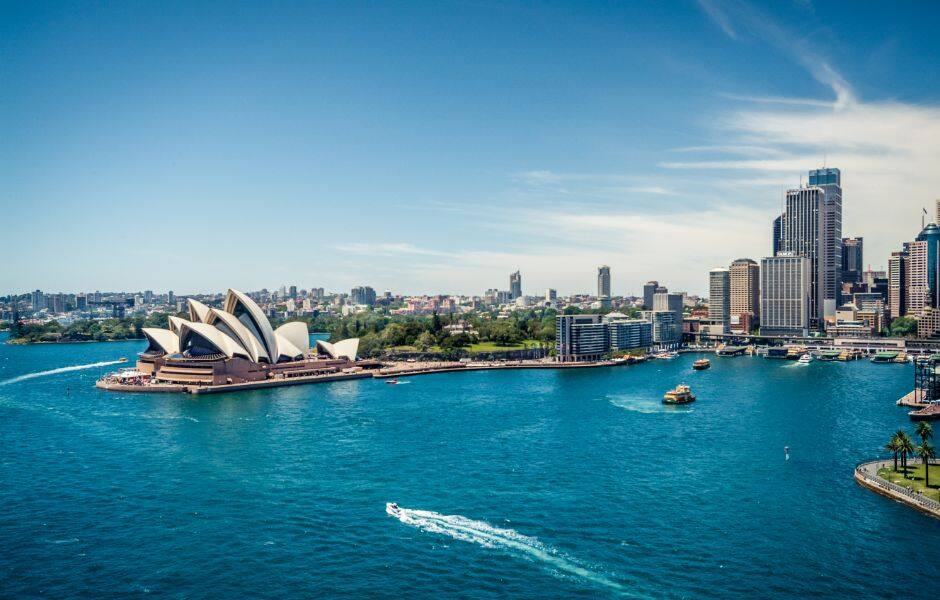 view of sydney opera house from the harbour bridge