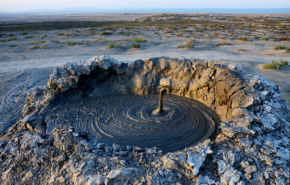 field with craters of mud volcano in gobustan azerbaijan