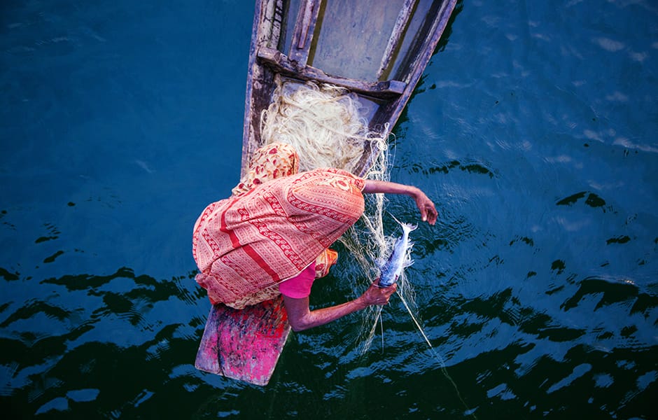 women fishing on boat in dhaka bangladesh