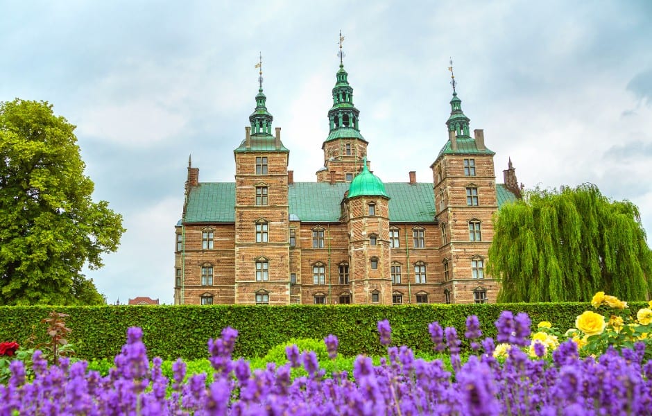 Rosenborg castle surrounded by blooming flowers