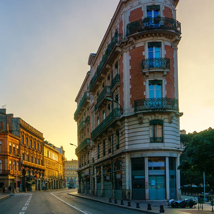 historic street with old buildings in toulouse france