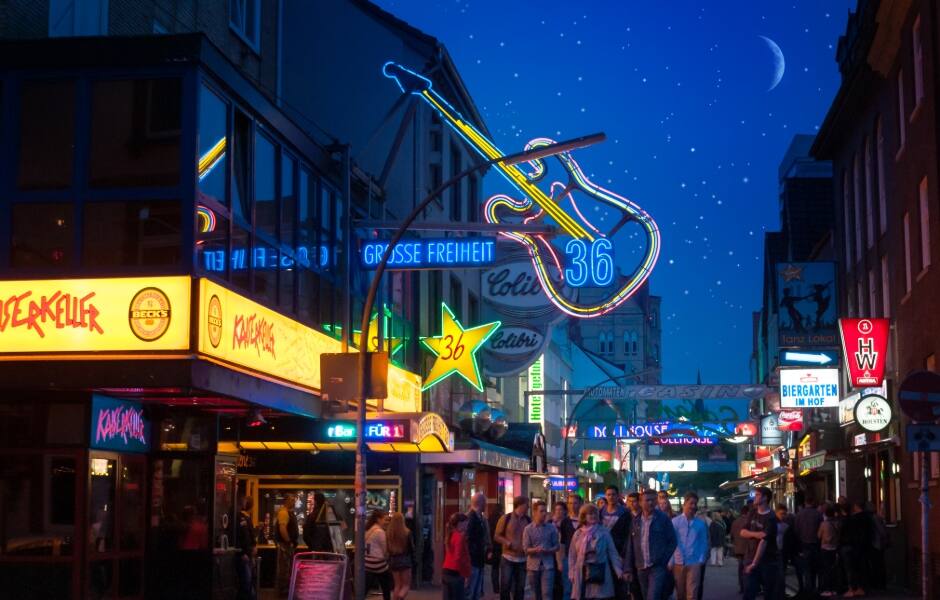  the reeperbahn street in hamburg lit up at night