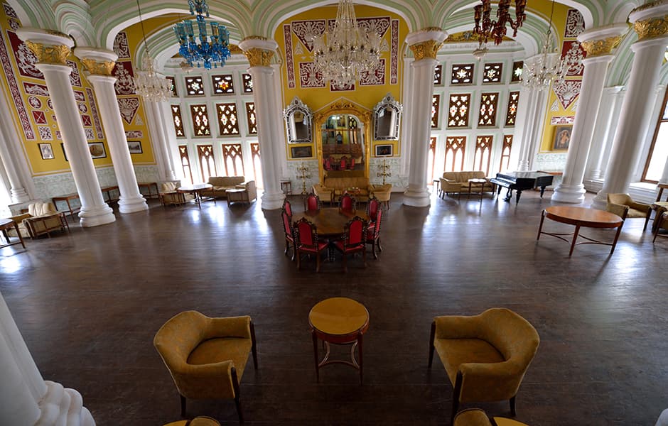 furniture inside a large room at bangalore palace india