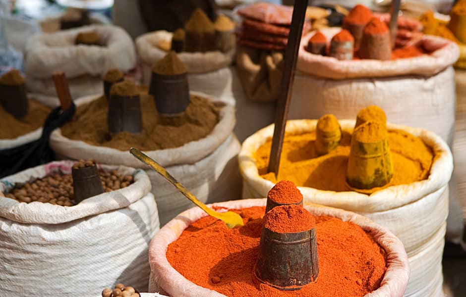 sacks of colourful local spices and dried food in dehli india