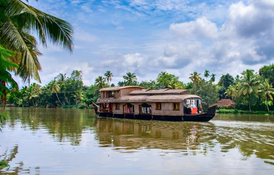 a house boat on a river in kochi