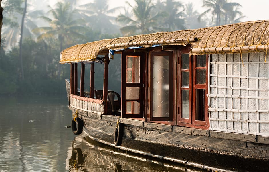 traditional boat house on shores in kochi