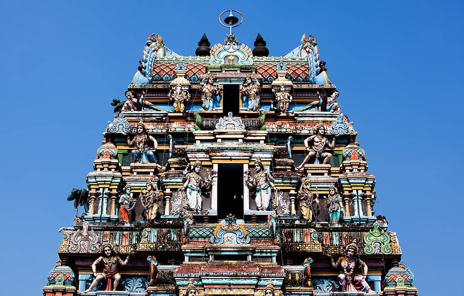 colourful vishnu temple and clear blue sky in kochi