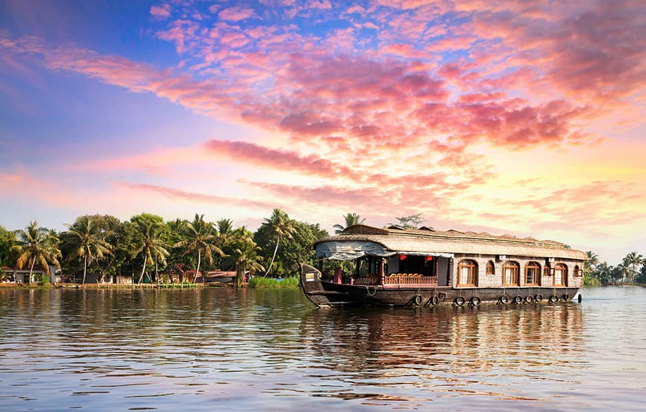 A houseboat cruising down Kozhikode Backwaters