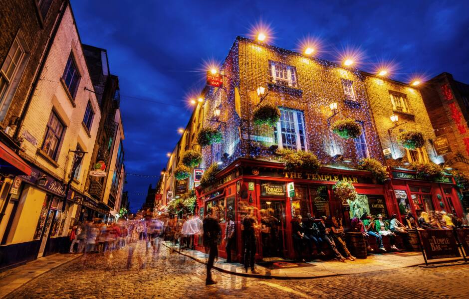 tourist in temple bar area at night dublin ireland