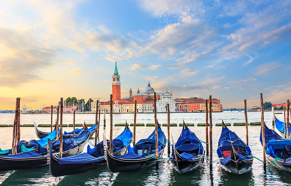 gondolas moored at grand pier venice