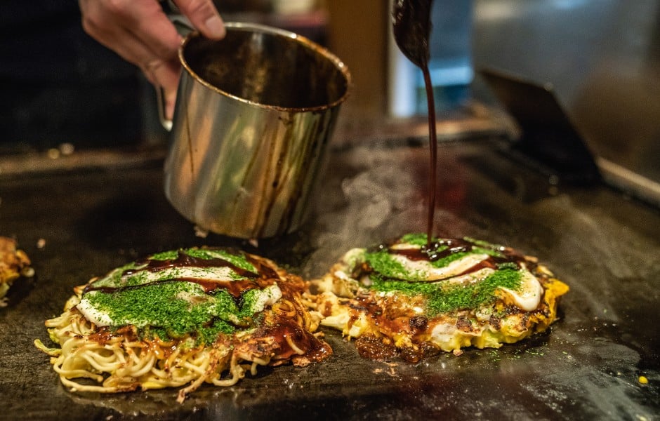 Okonomiyaki being cooked