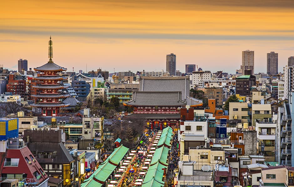 tokyo skyline with skyscrapers and zojoji temple