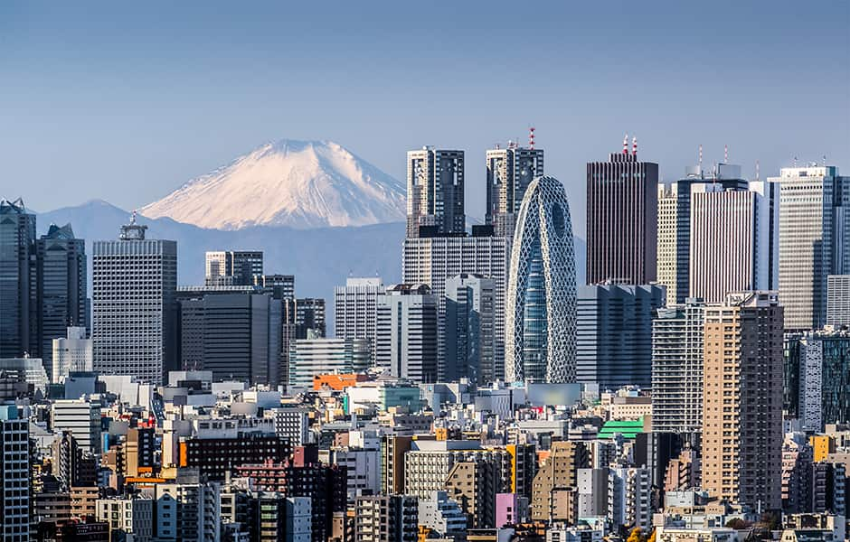 skyline view of shinjuku tokyo with mount fiji in distance