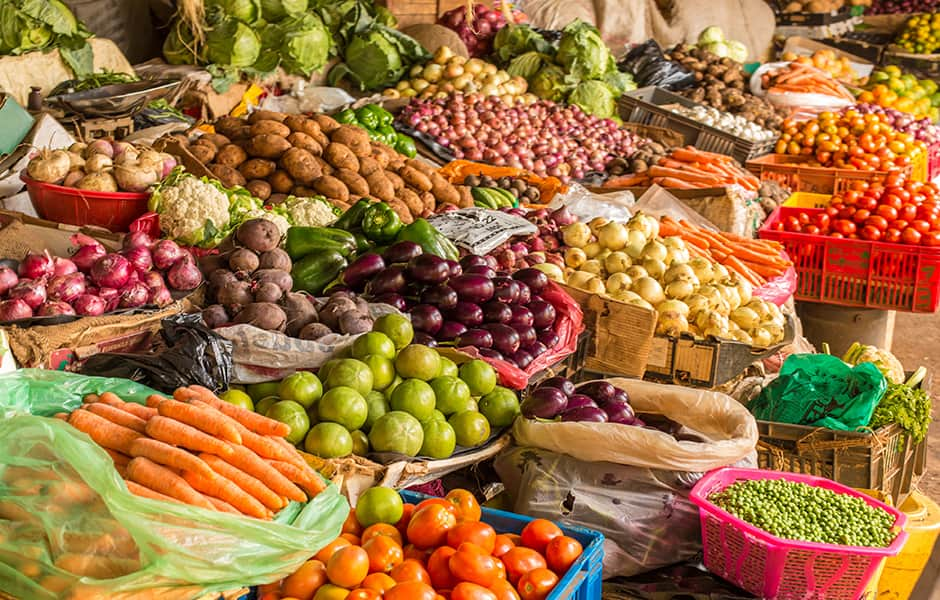 colourful fruits and vegetables on a nairobi market stall