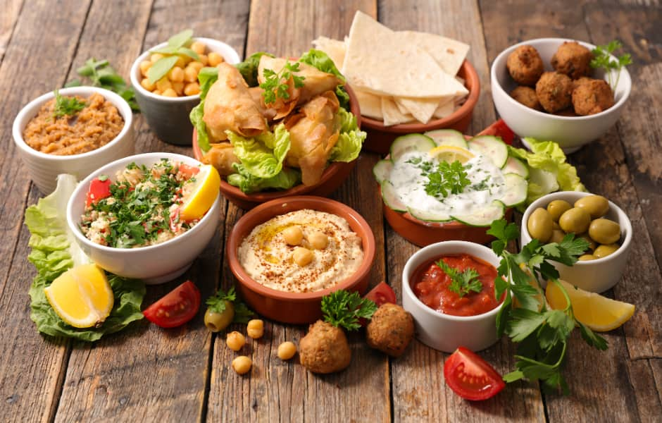 hummus olives bread falafel and assorted lebanese food