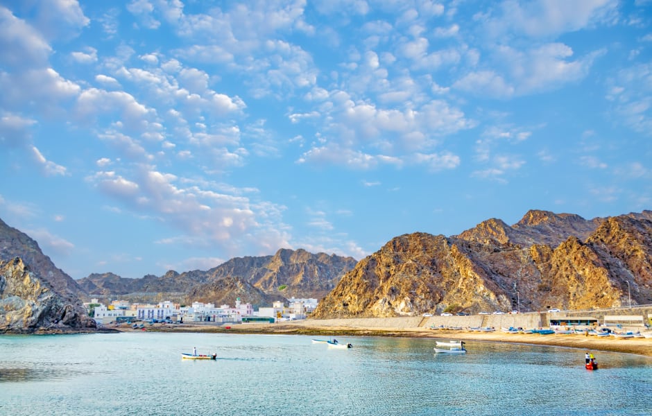 fishing village between mountain landscape in muscat