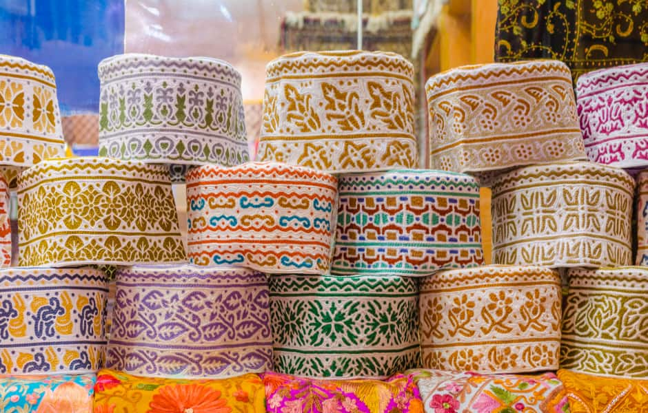 hats on display at the mutrah souq in muscat oman