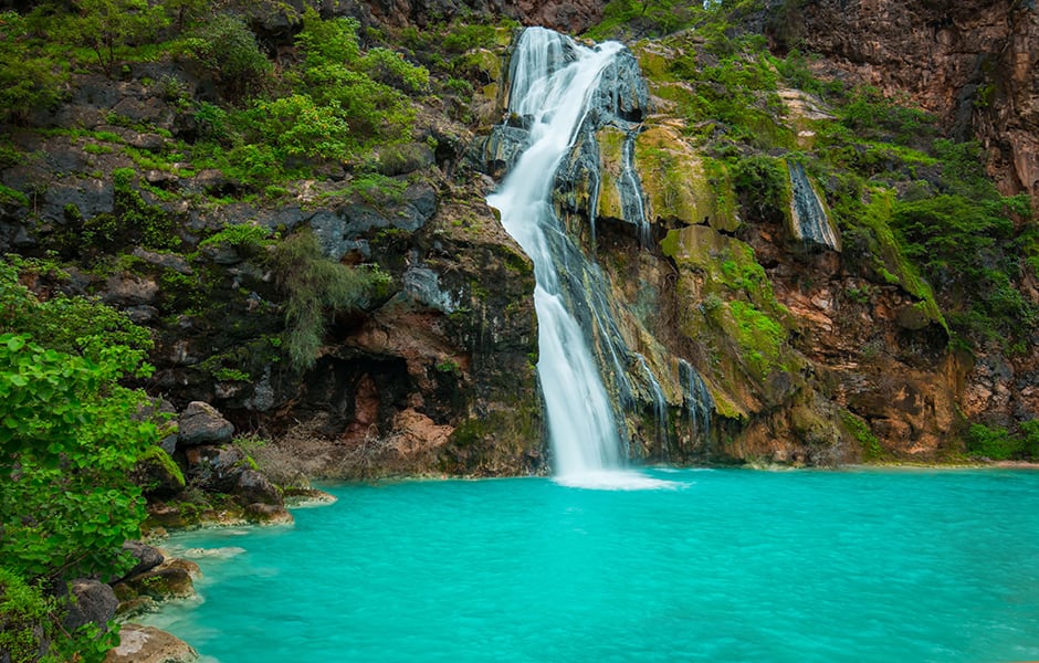 ayn khor waterfall salalah oman during khareef season