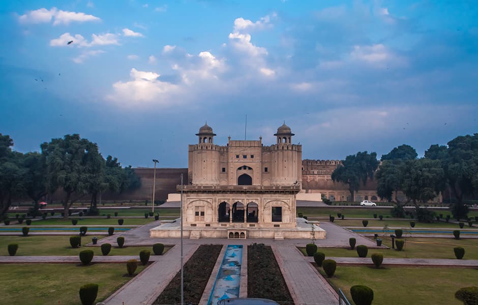 exterior view of lahore fort shahi qilla with small garden in foreground 