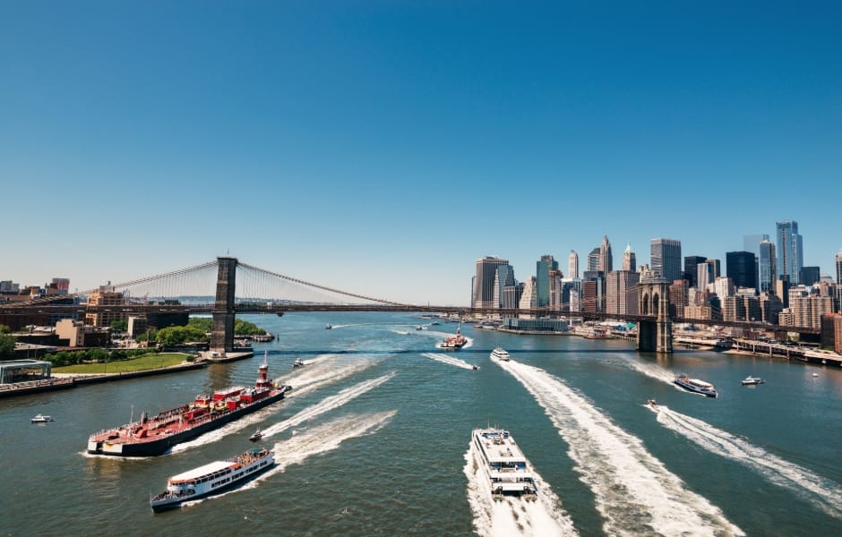 brooklyn bridge manhattan skyline ferries on the east river new york