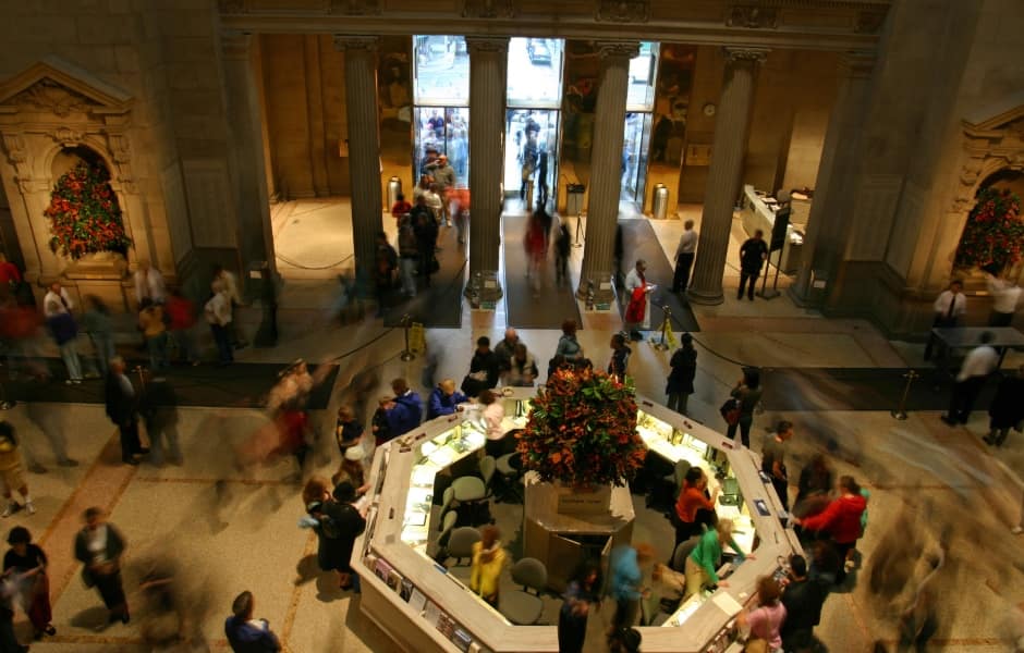 visitors gathered in the metropolitan museum of art 