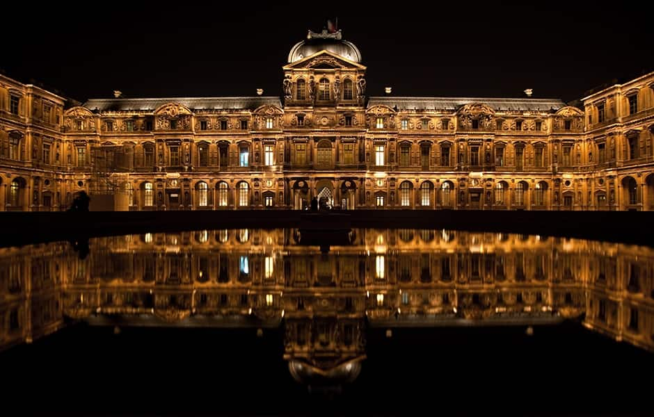 the louvre courtyard at night