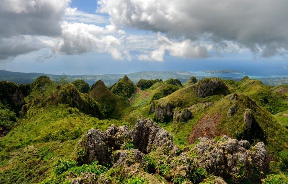 beautiful broad vista of craggy green peaks viewed from osmena peak cebu