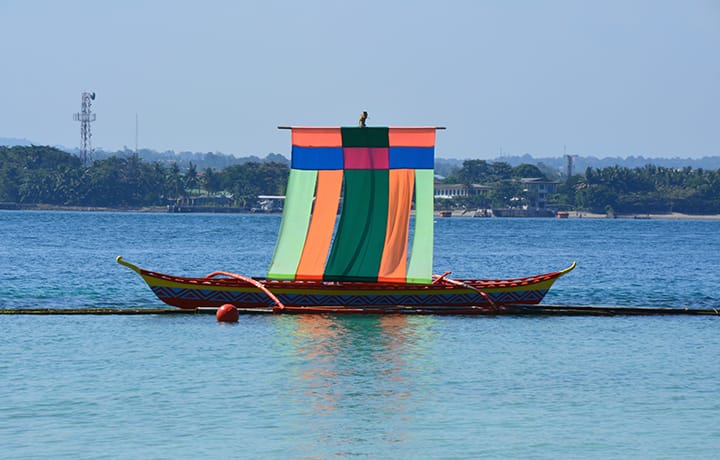 sail boat at paradise beach resort sama island davao