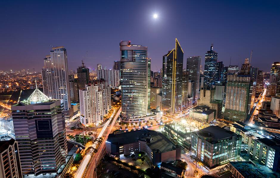 view of the city and skyline in manila at night