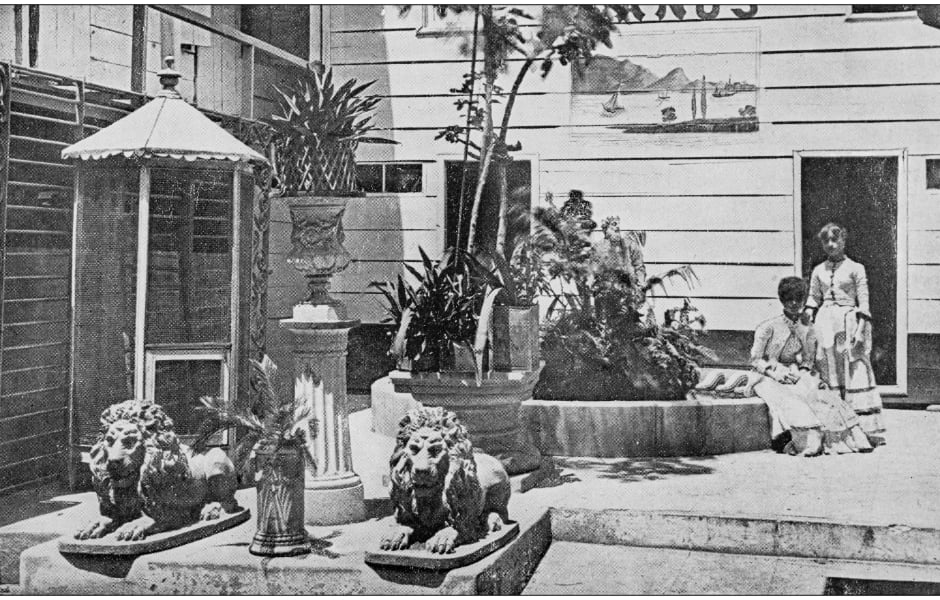 a black and white photo of a hotel yard in manila in the philippines