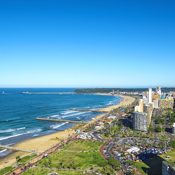 aerial shot of durban city and coastline