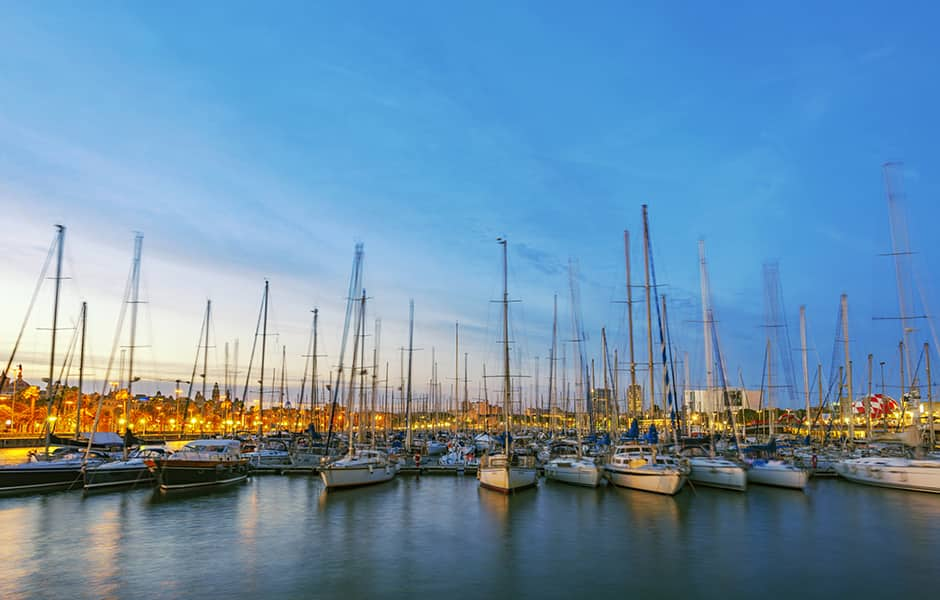 boats docked at port vell barcelona spain