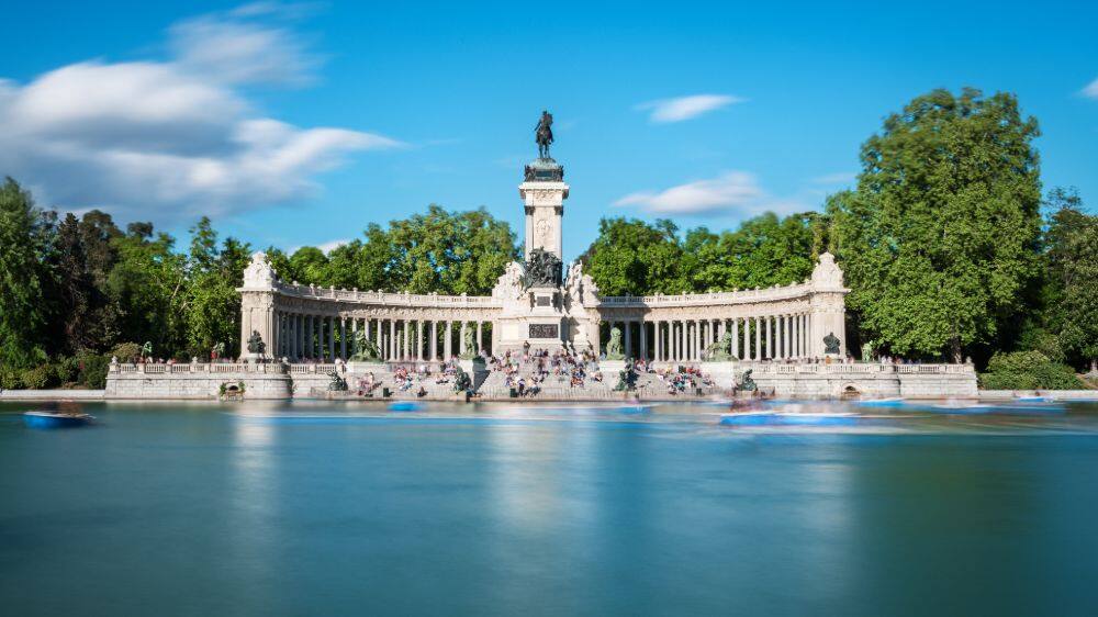 view of the great pond in retiro park madrid