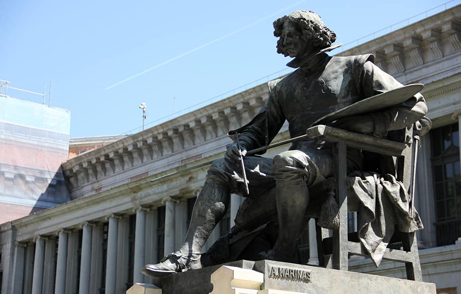 statue of diego velazquez at prado museum entrance in madrid