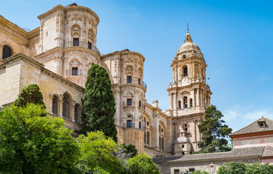 view of the cathedral in malaga spain on a sunny day