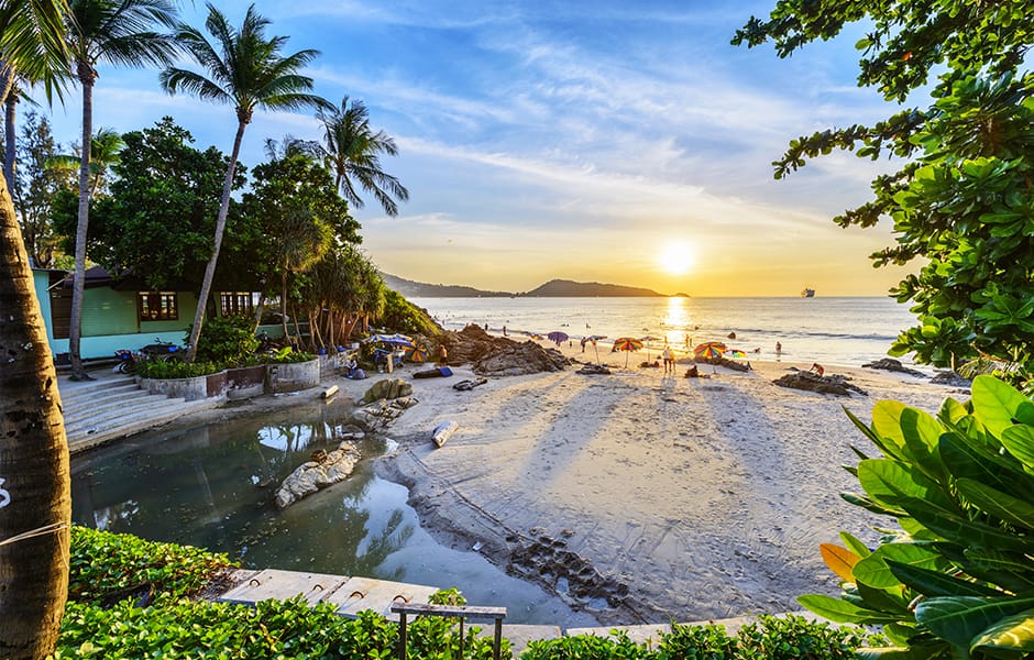 beautigful patong beach at sunset in phuket thailand