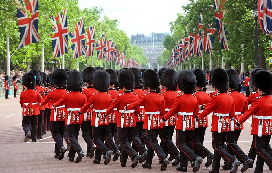 buckingham palace and guards marching london uk