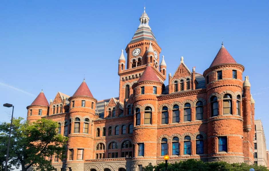 the county courthouse in dallas against blue sky