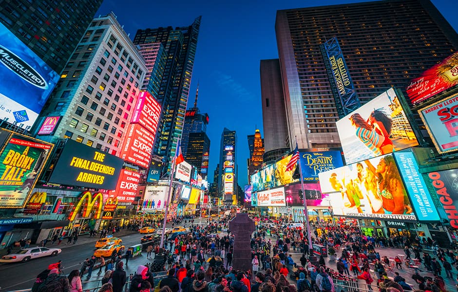 illuminated times square at night in new york city usa 