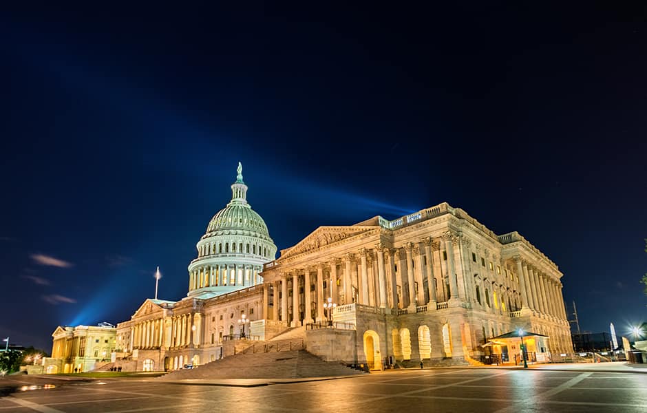 the capitol building at night in washington dc usa