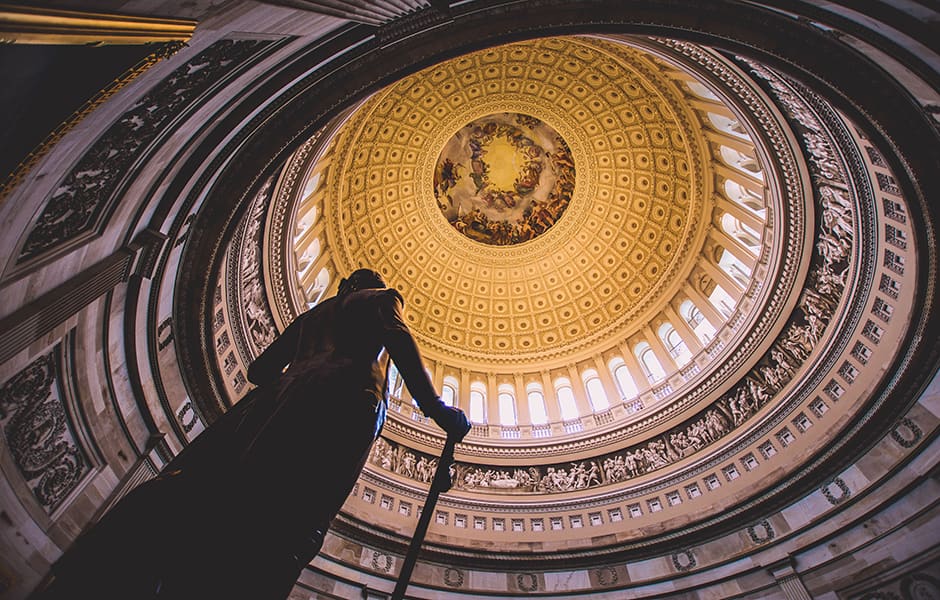 view inside the capital building rotunda dome and statue of george washington in usa